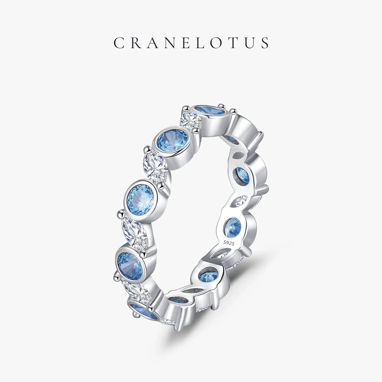 Azure Majesty: Ocean Blue CZ Eternity Ring in 925 Sterling Silver