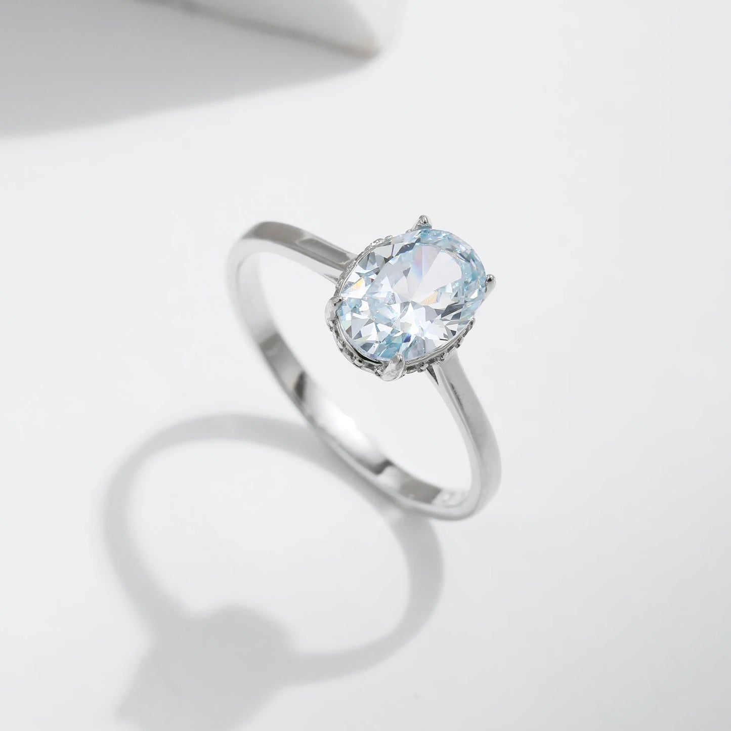 Oceanic Splendor: Sterling Silver Prong-Set Blue CZ Ring