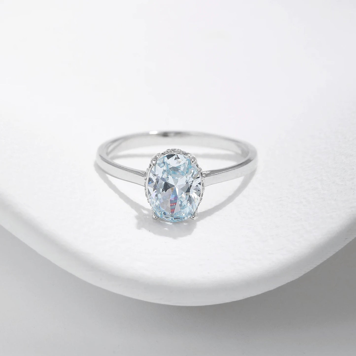 Oceanic Splendor: Sterling Silver Prong-Set Blue CZ Ring