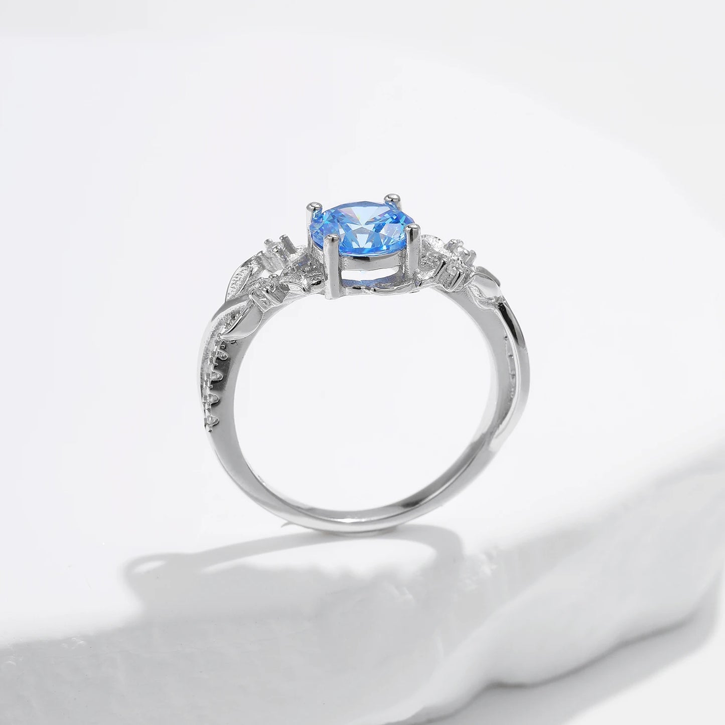 Oceanic Opulence: Sterling Silver Corollaceous Blue CZ Ring