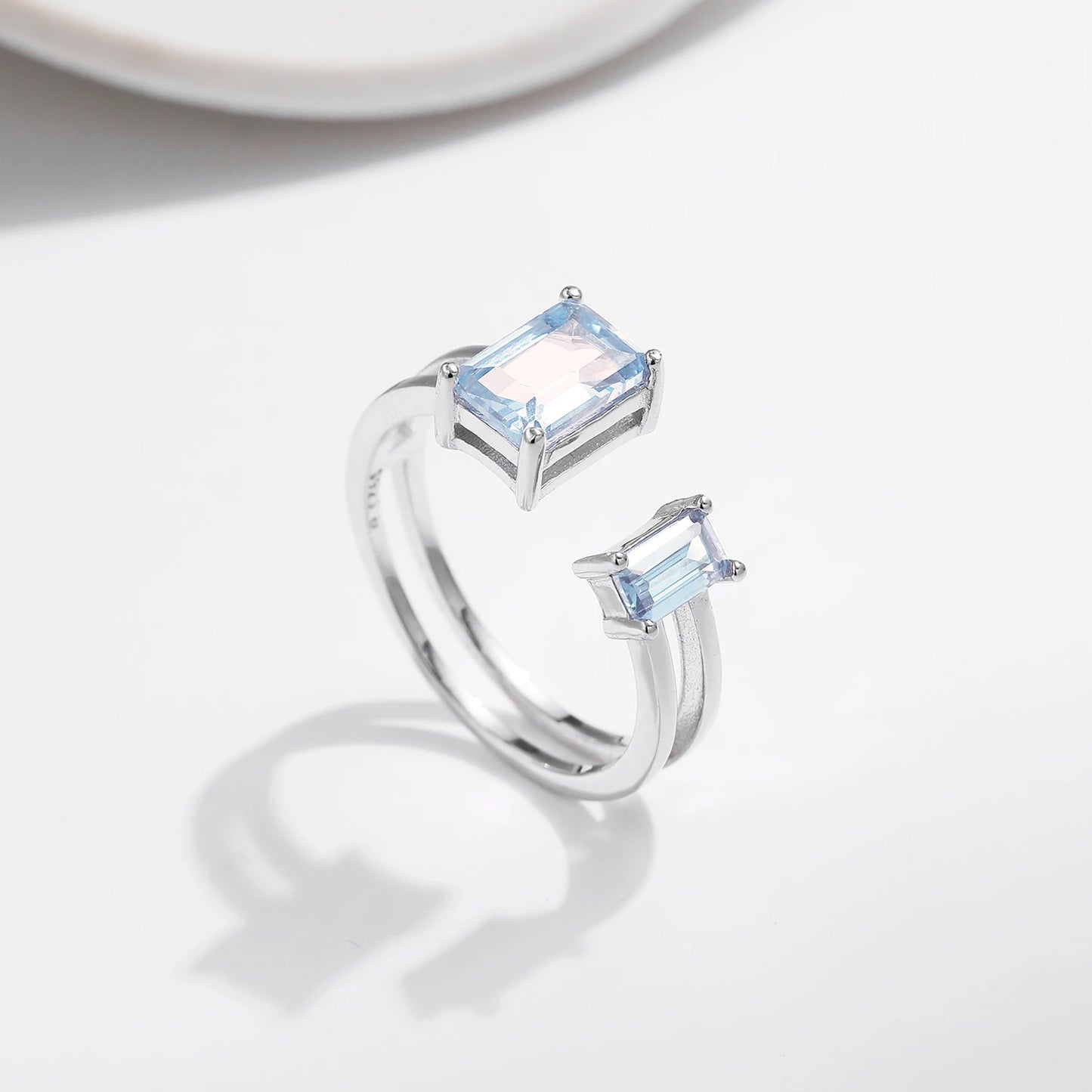 Azure Radiance: Sterling Silver Adjustable Rectangle Blue CZ Ring