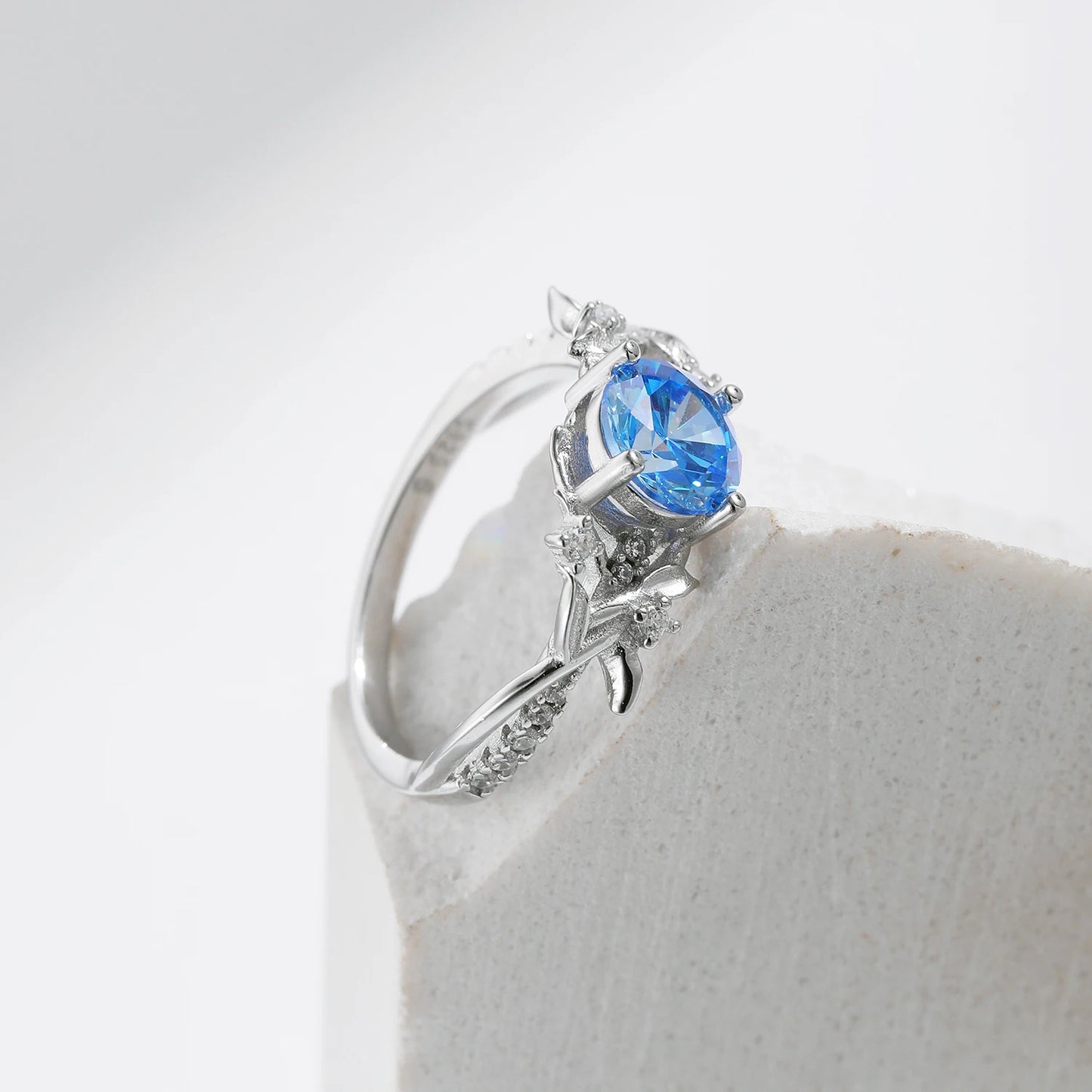 Oceanic Opulence: Sterling Silver Corollaceous Blue CZ Ring