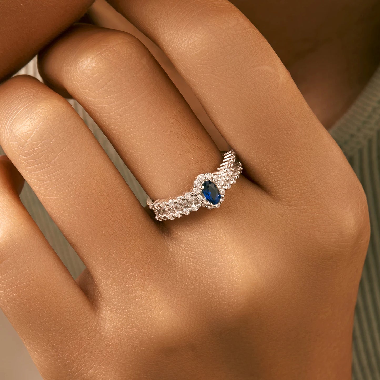 Sapphire Sparkle: Oval Blue CZ Wedding Band in 925 Sterling Silver