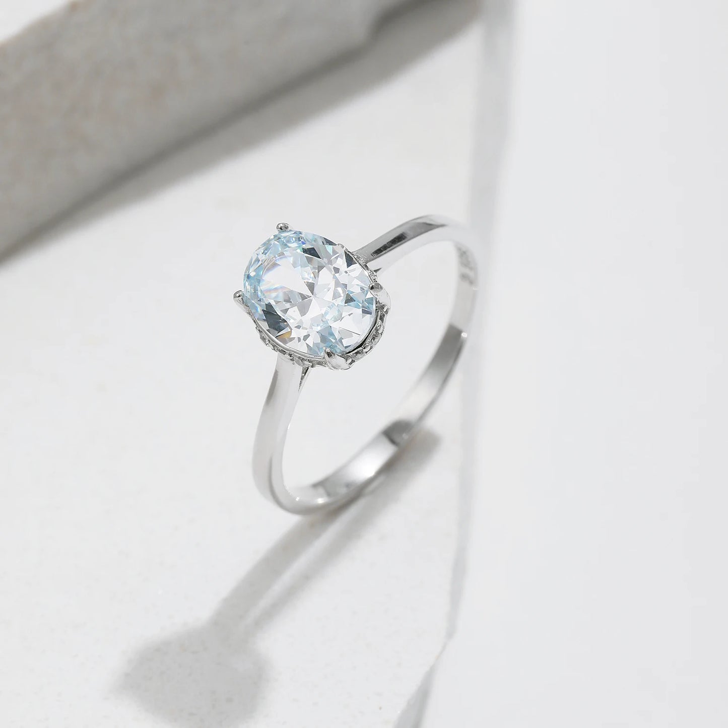 Oceanic Splendor: Sterling Silver Prong-Set Blue CZ Ring